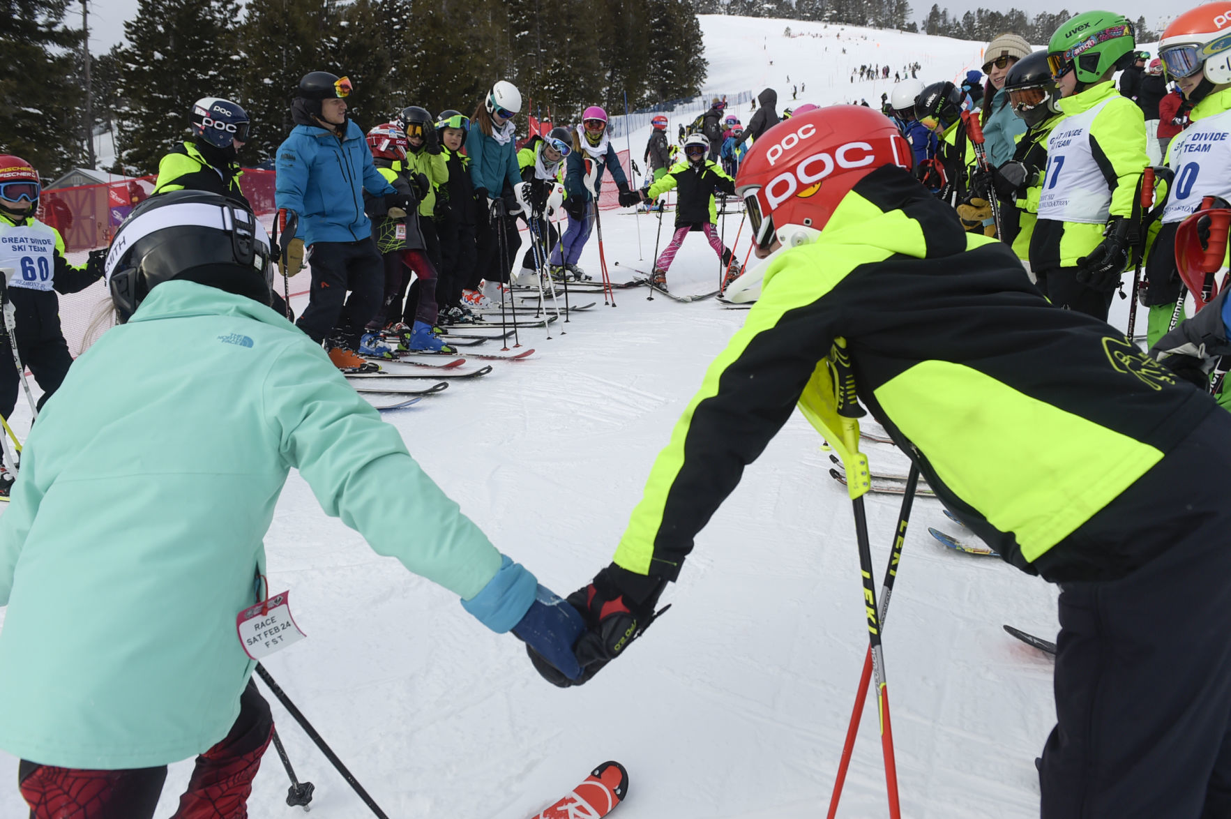 Youth ski racers thank the snow gods